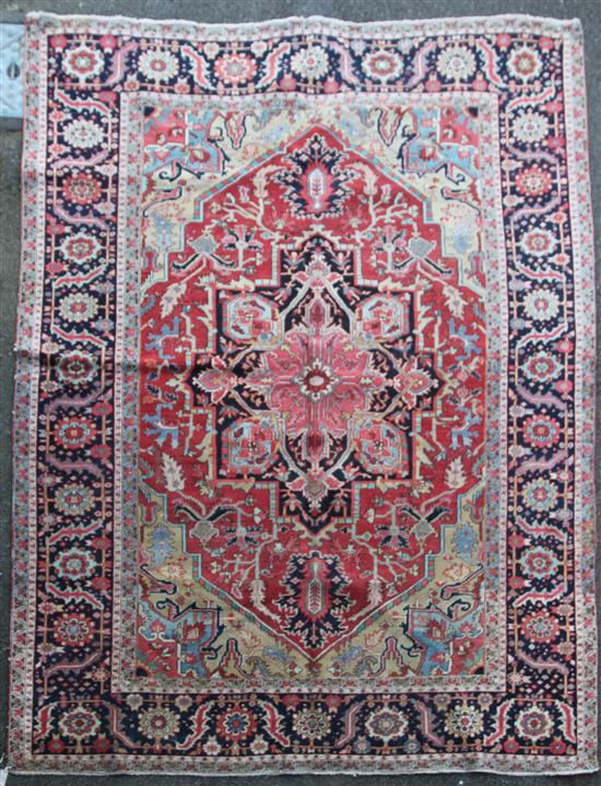 A Heriz carpet, 11ft 10in by 9ft 2in.